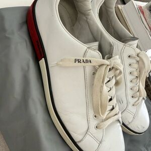 Prada Men's White Sneakers with Red and Black Details